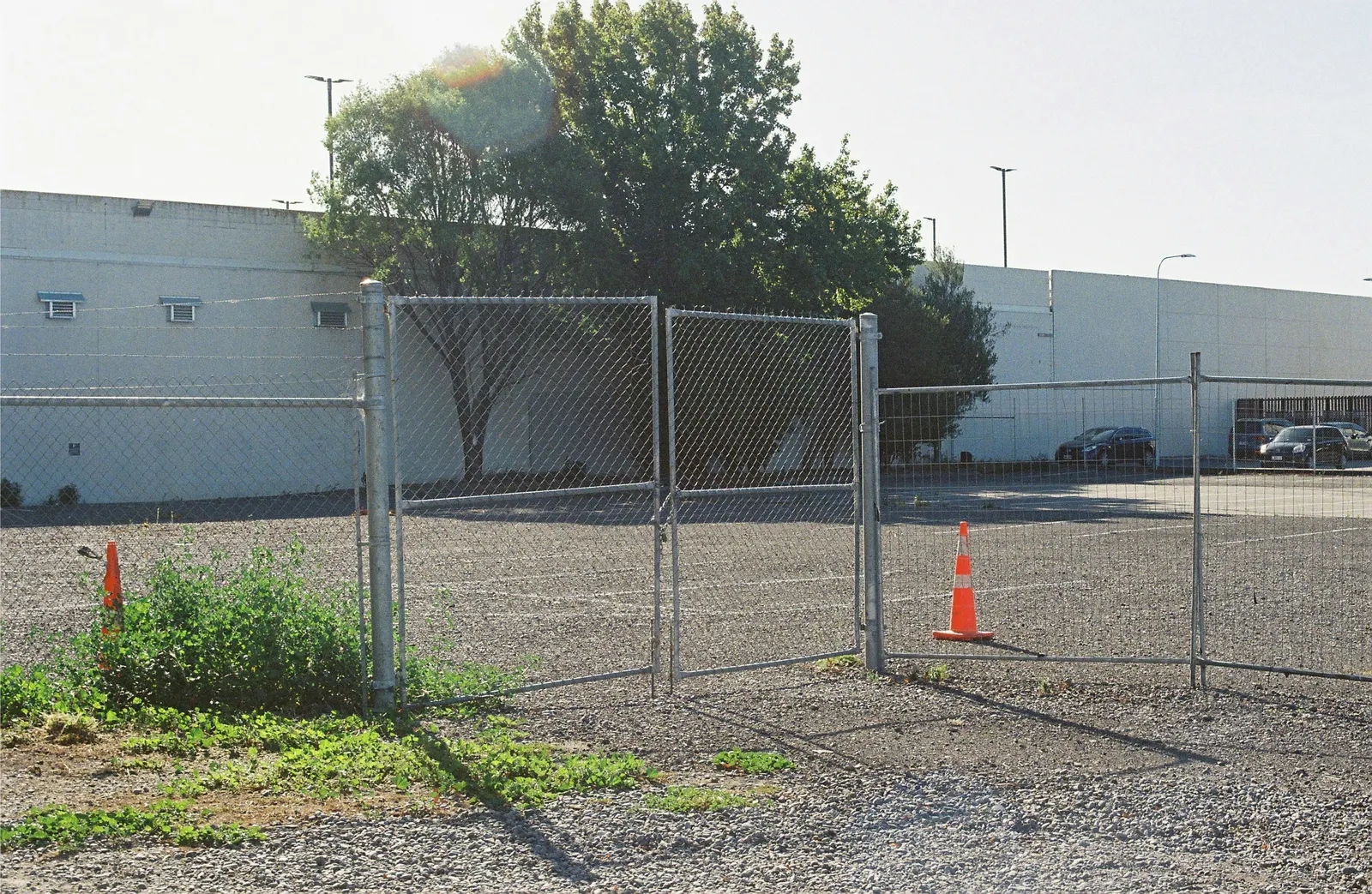 Gated outdoor storage lot with a chain-link fence